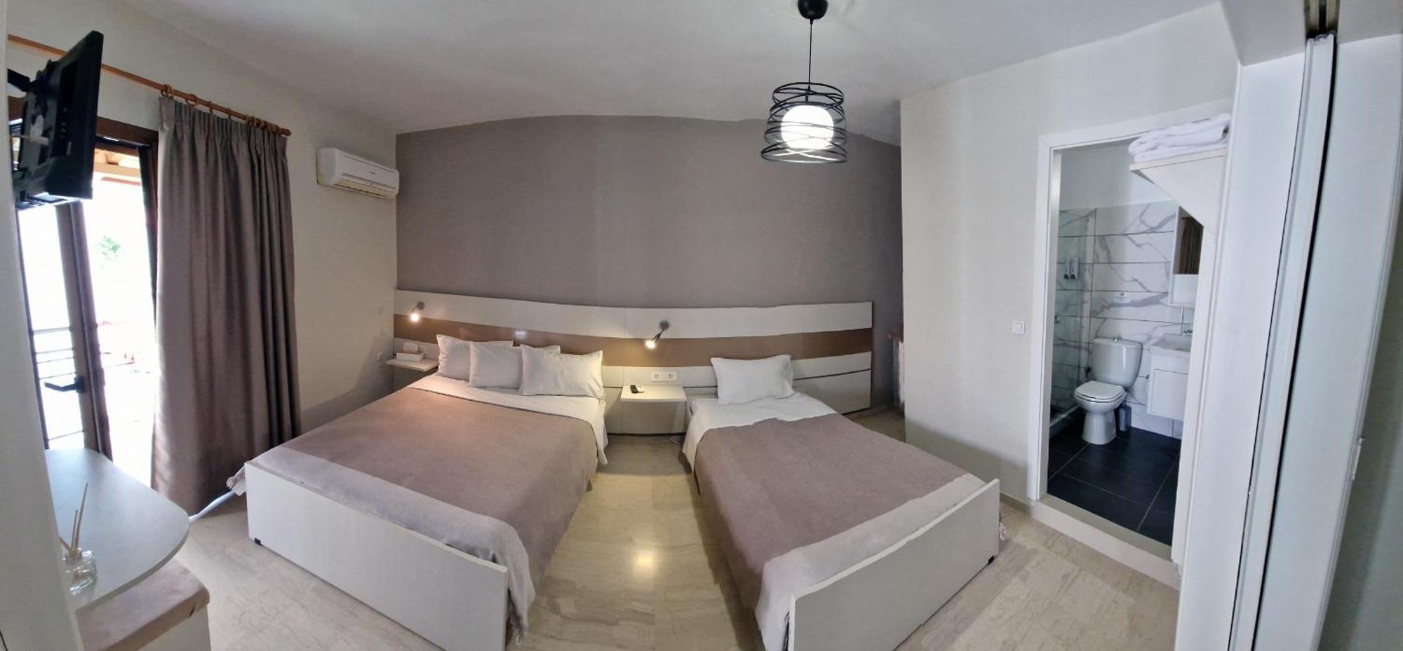 איגומניטסה Paradosi Apartments מראה חיצוני תמונה