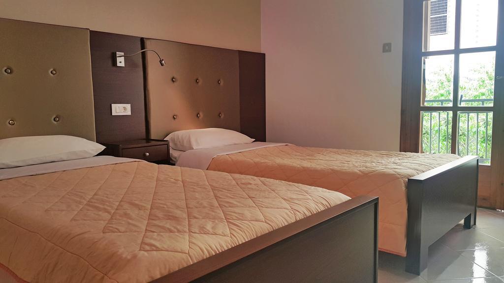 איגומניטסה Paradosi Apartments מראה חיצוני תמונה